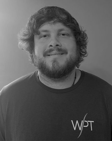 Black and white headshot of Zach Eisiminger