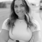 Black and white headshot of Katie Yocca, chiropractor at WPT